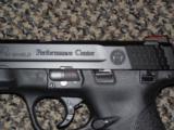 S&W MODEL M&P PERFORMANCE CENTER SHIELD IN.40 CAL WITH PORTED BARREL AND FIBER OPTIC SIGHTS - 2 of 5