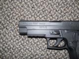 SIG SAUER P-226 DAO PISTOL in .40 S&W WITH THREE MAGS - 1 of 4