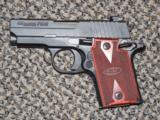 SIG SAUER P-938 IN 9 MM WITH NIGHTSIGHTS AND ROSEWOOD GRIPS - 1 of 5