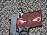 SIG SAUER P-938 IN 9 MM WITH NIGHTSIGHTS AND ROSEWOOD GRIPS - 2 of 5