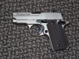SIG SAUER P-238 IN NICKEL WITH VECTOR GRIPS AND NIGHTSIGHTS - 1 of 6