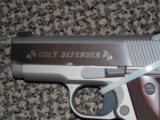 COLT STAINLESS DEFENDER .45 ACP PISTOL WITH THIN-TECH GRIPS - 2 of 5
