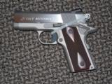 COLT STAINLESS DEFENDER .45 ACP PISTOL WITH THIN-TECH GRIPS - 1 of 5