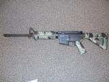 COLT M4 (LE6920) TACTICAL CARBINE WITH MAGPUL "TIGER STRIPE" FURNITURE - 1 of 3