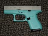 GLOCK 42 IN .380 ACP FINISHED IN "ROBIN EGG BLUE" - 1 of 4