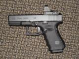 GLOCK GEN 4 MODEL 19 MOS 9 MM PISTOL WITH LEUPOLD DELTA POINT PRO SIGHT - 1 of 7