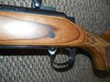 REMINGTON 700 VARMINTER RIFLE IN .22-250 HEAVY BARREL LAMINATED STOCK - 3 of 7