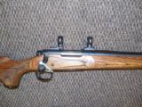 REMINGTON 700 VARMINTER RIFLE IN .22-250 HEAVY BARREL LAMINATED STOCK - 5 of 7