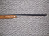 REMINGTON 700 VARMINTER RIFLE IN .22-250 HEAVY BARREL LAMINATED STOCK - 4 of 7