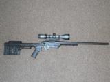 CUSTOM REMINGTON 700 TACTICAL RIFLE IN MDT LSS TACTICAL STOCK WITH SIG SAUER SCOPE, THREADED BARREL - 11 of 12