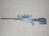 CUSTOM REMINGTON 700 TACTICAL RIFLE IN MDT LSS TACTICAL STOCK WITH SIG SAUER SCOPE, THREADED BARREL - 6 of 12