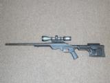 CUSTOM REMINGTON 700 TACTICAL RIFLE IN MDT LSS TACTICAL STOCK WITH SIG SAUER SCOPE, THREADED BARREL - 1 of 12