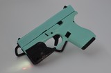 GLOCK 42 IN TIFFANY BLUE WITH STREAMLIGHT LASER - 3 of 7