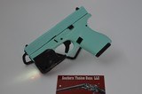 GLOCK 42 IN TIFFANY BLUE WITH STREAMLIGHT LASER - 1 of 7