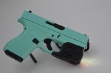 GLOCK 42 IN TIFFANY BLUE WITH STREAMLIGHT LASER - 6 of 7