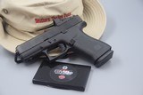 GLOCK 43X MOS WITH FACTORY-INSTALLED SHIELD DOT SIGHT TALO GUN - 1 of 9