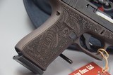 GLOCK MODEL 43X WITH ELEPHANT MOTIF LASER ENGRAVED DARK TAN LOWER RECEIVER IN 9 MM - LAST ONE;
LOWER PRICE!! - 2 of 4