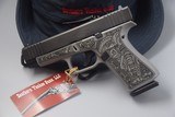 GLOCK MODEL 48 WITH ELEPHANT MOTIF LASER-ENGRAVED LOWER RECEIVER IN GREY - 1 of 6