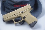 GLOCK MODEL 43 SUB-COMPACT 9 MM PISTOL IN FLAT DARK EARTH - 1 of 7