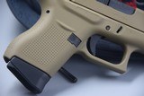 GLOCK MODEL 43 SUB-COMPACT 9 MM PISTOL IN FLAT DARK EARTH - 2 of 7