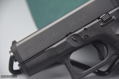 GLOCK MODEL 28 SCARCE TALO PISTOL IN .380 ACP - EASIER-RACK SLIDE... - Image 6 of 7