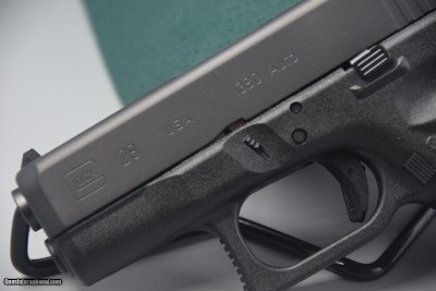 GLOCK MODEL 28 SCARCE TALO PISTOL IN .380 ACP - EASIER-RACK SLIDE... - Image 3 of 7
