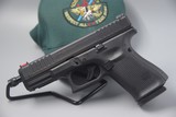 GLOCK MODEL 44 TALO EDITION .22 LR PISTOL WITH THREADED BARREL AND AMERIGLO FRONT SIGHT - 1 of 6