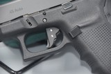 GLOCK MODEL 41 LONG-SLIDE .45 ACP PISTOL WITH VICKERS TRIGGER UPGRADE AND EXTENDED SLIDE ASSIST - 4 of 8