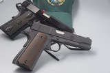 SPRINGFIELD ARMORY 1911 PAIR: POSSIBLE FATHER SON GIFTA GARRISON AND DEFENDER MIL SPEC IN .45 ACP