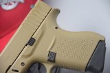 GLOCK MODEL 43 SUB-COMPACT UPGRADED WITH A SHIELD ARMS 9-ROUND STEEL MAGAZINES 9 MM PISTOL FINISHED IN FDE - 9 of 13
