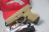 GLOCK MODEL 43 SUB-COMPACT UPGRADED WITH A SHIELD ARMS 9-ROUND STEEL MAGAZINES 9 MM PISTOL FINISHED IN FDE