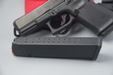 GLOCK 19 FIFTH GEN WITH FACTORY NIGHTSIGHTS AND 20-ROUND MAG... - 10 of 11
