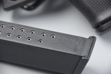GLOCK 19 FIFTH GEN WITH FACTORY NIGHTSIGHTS AND 20-ROUND MAG... - 7 of 11