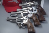 S&W MOUNTAIN GUN COLLECTION WITH 4 REVOLVERS ONE PRICE
