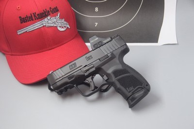 H&K MODEL CC9 PISTOL WITH FACTORY-INSTALLED HOLOSUN SIGHT