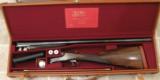 Cogswell & Harrison cased 12 gauge with sideplates, engraved - 1 of 1