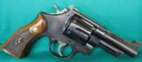 Pre Model 26. S&W Model of 1950 in 45 ACP with four inch barrel. five screw - 1 of 2