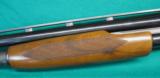 Winchester Deluxe Model 12 in 20 gauge with Simmons Rib.
- 3 of 11
