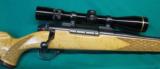 German 7mm Wea. Birdseye maple stock with 3.5-10X Leupold - 1 of 8
