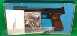 Model 41 S&W in the original box with documents
- 7 of 8