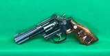 S&W 22 LR model 17-6, 4 inch full lug barrel with combat grips. - 2 of 3