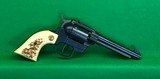 Hi-Standard double nine 22 LR revolver with faux stag grips. - 2 of 4