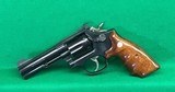 S&W 16-4, 32 H&R magnum with 4 inch barrel and combat grips - 2 of 4