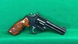 S&W Model 16-4, four in 32 H&R magnum with combat grips. - 1 of 6