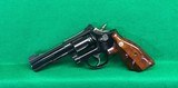 S&W Model 16-4, four in 32 H&R magnum with combat grips. - 2 of 6