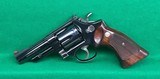 S&W model 57 (no dash) four inch 41 Magnum, blue. - 1 of 4