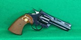 Colt Diamondback in 22LR with 4 inch barrel, original grips. - 1 of 6