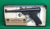 Early Ruger Mark 1, with box, paper and extra clips. - 1 of 7