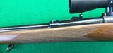 Pre-64 M70 Winchester from 1952 with 2-7X Burris scope. - 2 of 14