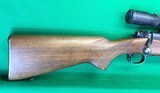 Pre-64 M70 Winchester from 1952 with 2-7X Burris scope. - 13 of 14